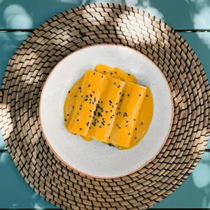 Canelones ROSSINI con champiñones y salsa de calabaza con coco